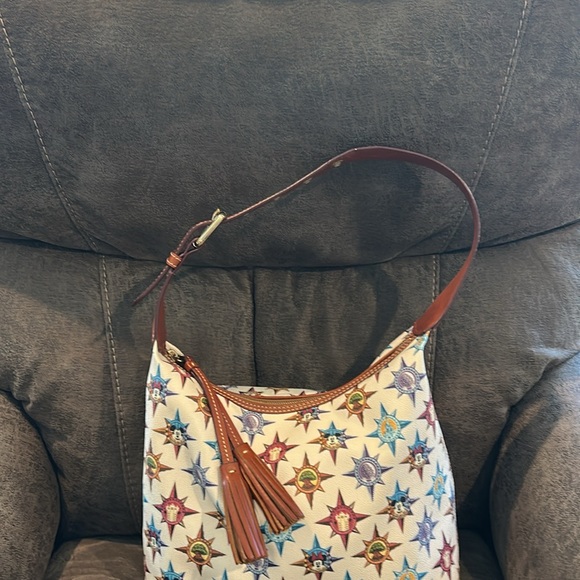 Dooney and Bourke Disney’s passport pattern satchel gently used zipper closure - Picture 3 of 11